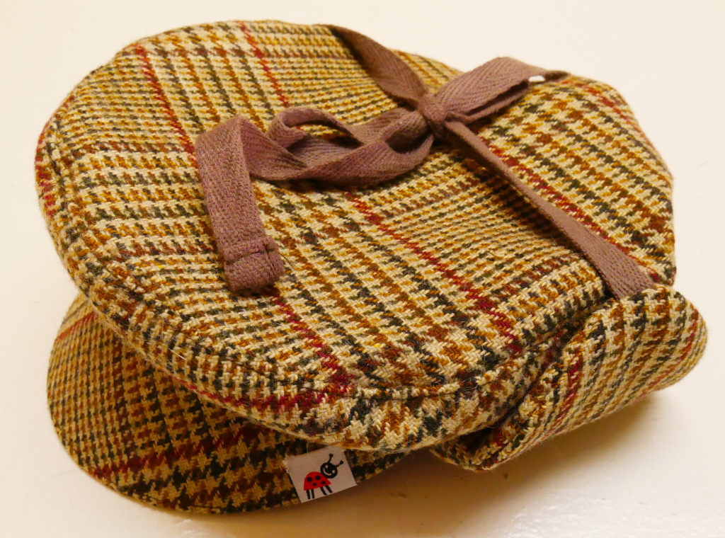 Varmfodrad keps med öronlappar baby stl 68cl/42cm